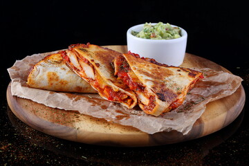 Quesadilla with white and red sauce