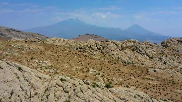 Mount Ararat is a snow-capped and dormant compound volcano in the extreme east of Turkey. It consists of two major volcanic cones: Greater Ararat and Little Ararat. Greater Ararat is the highest peak.