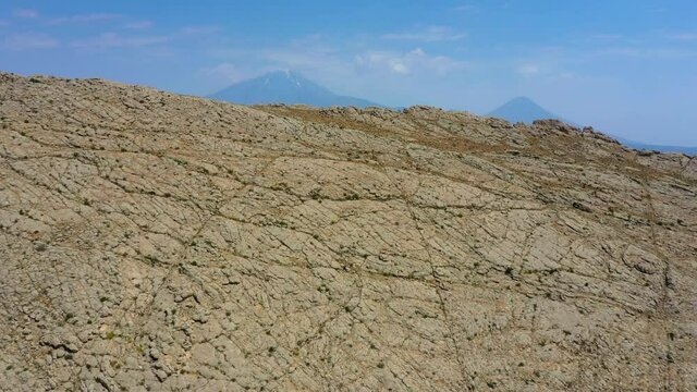 Mount Ararat is a snow-capped and dormant compound volcano in the extreme east of Turkey. It consists of two major volcanic cones: Greater Ararat and Little Ararat. Greater Ararat is the highest peak.