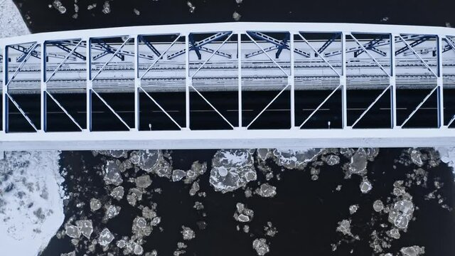 Floe on river and bridge. Bydgoszcz in winter.