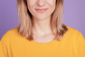 Closeup cropped photo of beautiful woman lips correction isolated on violet color background