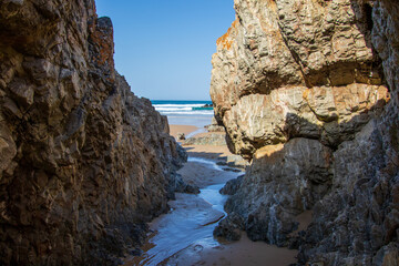 Fototapeta na wymiar Beach sand and rock formations on Keurboomsriver Beach on the Garden Route in South Africa