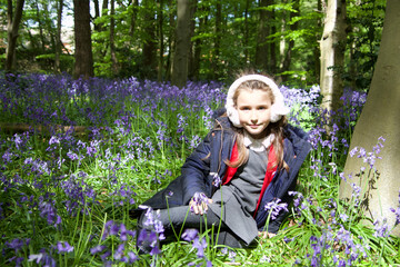 Fototapeta na wymiar young girl in a bluebell forest, bluebells, blue, bells, forest, wood, pretty, after school, spring, 