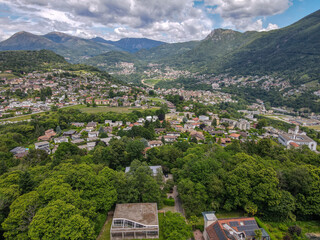 Fototapeta na wymiar Drone view at Porza and Colla valley over Lugano on the italian part of Switzerland
