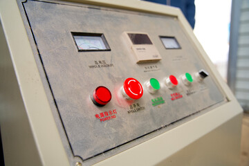 Close up of an industrial control panel in a recycling factory