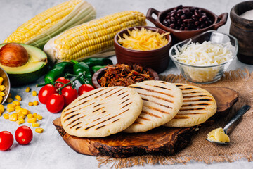 Arepas made with corn flour and cooked in a pan, it is similar to a corn tortilla