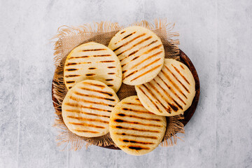  Top view of arepas made with corn flour, Latin American food concept