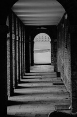 B&W image of 18th Century Brick Colonnade Archway 