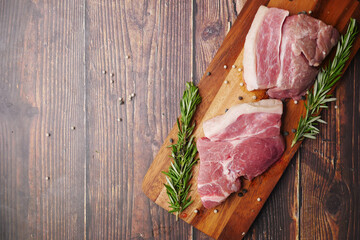  raw meat on chopping board on a chopping board 