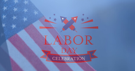 Image of labour day celebration text with fireworks over american flag on blue