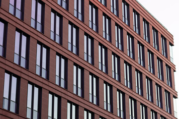 Obraz premium Part of facade modern urban building, bottom-up view.