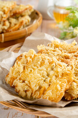 Pisang goreng is a fritter made by deep frying battered plantain in hot oil. The batter most commonly uses a combination of flour, either wheat, rice flour, tapioca or bread crumb.