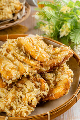 Pisang goreng is a fritter made by deep frying battered plantain in hot oil. The batter most commonly uses a combination of flour, either wheat, rice flour, tapioca or bread crumb.