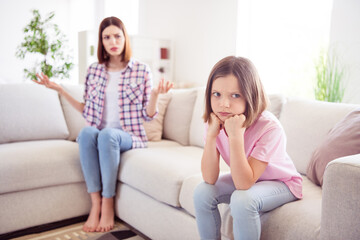 Photo of unhappy furious mad upset little girl sisters bad mood conflict indoors inside house home...