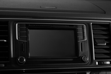 Obraz na płótnie Canvas Closeup view of dashboard with navigation system in modern car
