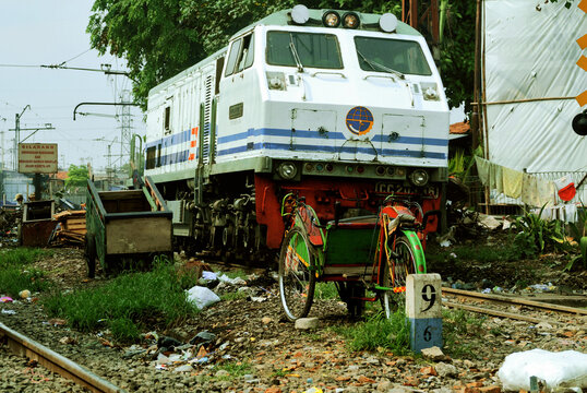 A Passenger train on railway in Jakarta