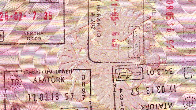 Passport, visa of arrival, departure, macro view. Turkish stamp.