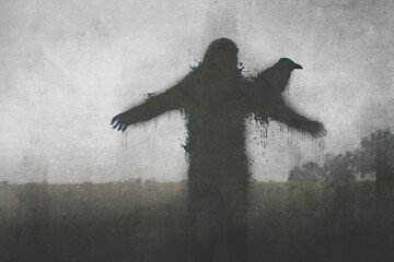 A dark scary concept. Of a mysterious scarecrow monster figure, standing in a field. With a grunge, textured edit. © Dave