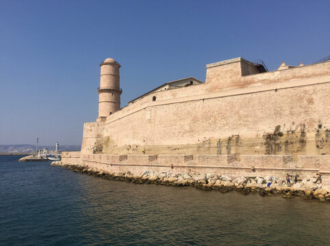 The Fort Saint Jean with the large round Tour du Fanal tower, one of the most visited monuments in Marseille. It is connected to the former port by a footbridge.