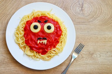 Dracula spaghetti creative food for Halloween made from spaghetti,mozzarella sheet,black...