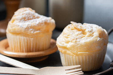 Vanilla cupcakes on a black background