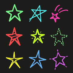 Fototapeta na wymiar Hand drawn colored stars on isolated black background. Freehand elements. Colorful illustration