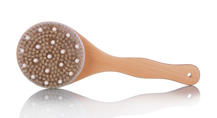 Body brush with natural bristles and wooden handle isolated on white