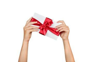 Gift with a bright red ribbon and a bow in the hands of a girl isolated on a white background. Presentation of the gift offering. Design element.