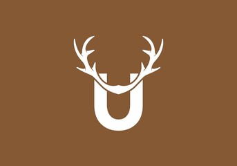 White brown color of U initial letter with deer horn © Adipra