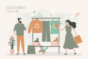 Girl chooses t-shirt made from recycled material. Man buys sweater in eco-friendly store