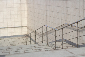 Staircase at the pedestrian crossing. Place of descent by steps.
