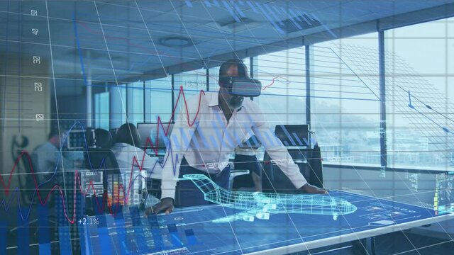 Digital interface with data processing on african american businessman wearing vr headset at office