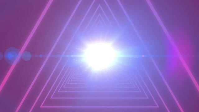 Digital animation of triangle shapes in seamless motion against spot of light on purple background
