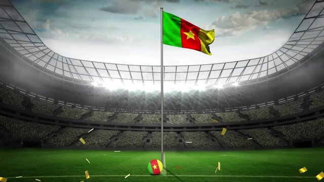 Golden confetti falling over waving cameroon flag against sports stadium in background