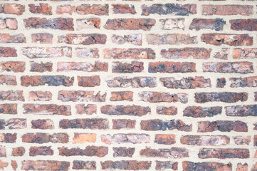 Brick wall background, orange natural baked brick wall texture