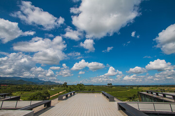 Fototapeta premium green farm sky clouds beautiful mountains good weather