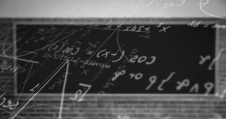 Digital image of mathematical equations and diagrams floating against black background