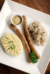 german thuringer sausage with mashed potato and sauerkraut meal