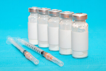 vaccine, medicine, vial, syringe for injection. Vaccination, treatment for coronavirus Covid 19. Unbranded