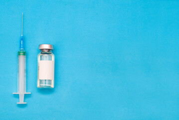 vaccine, medicine, vial, syringe for injection. Vaccination, treatment for coronavirus Covid 19. Unbranded