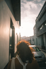 Person in the city of Ponta Delgada during Golden Hour