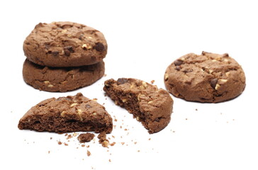 Round chocolate and hazelnut cookies isolated on white background