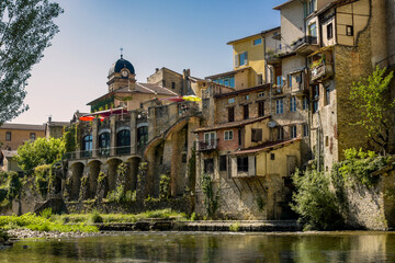 rural landscape with a view on the town of pont en royans and her houses on the cliff