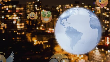 Spinning globe and multiple face emoji icons floating against aerial view of cityscape at night