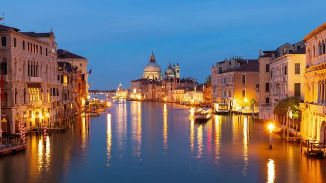 Time Lapse of the Grand Canal in Venice Italy at Twilight. Basilica di Santa Maria della Salute is in the background