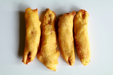 Pazhampori, a traditional Kerala tea time snack made of maida and sliced ripe banana, selective focus