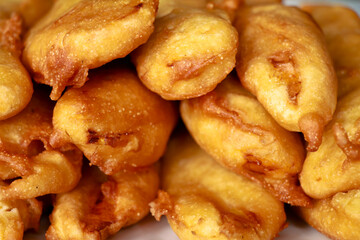 Pazhampori, a traditional Kerala tea time snack made of maida and sliced ripe banana, selective focus