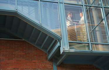 Fototapeta premium University of Economics students seen through window / Krakow, Poland