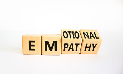 Emotional empathy symbol. Turned wooden cubes and changed the word 'Emotional' to 'Empathy'. Beautiful white table, white background, copy space. Psychology, emotional empathy concept.