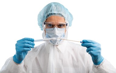 Medical healthcare technologist holding COVID-19 swab kit, wearing white protective suit and mask